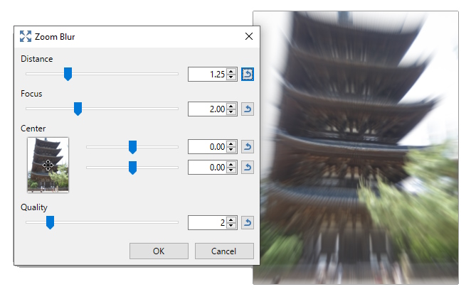 Effects > Blurs > Zoom Blur